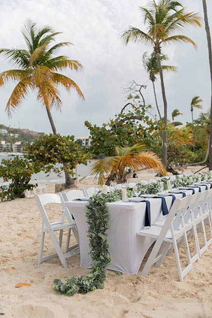 Beautiful wedding reception table on a stunning Caribbean beach.